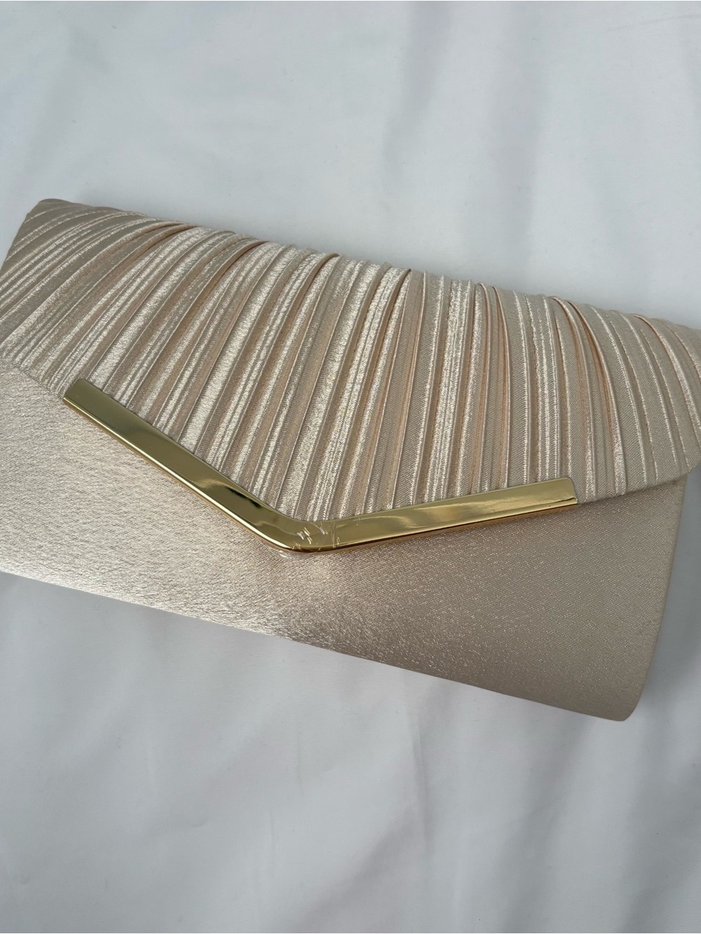 Elegant Champagne Satin Clutch with Gold V Accent